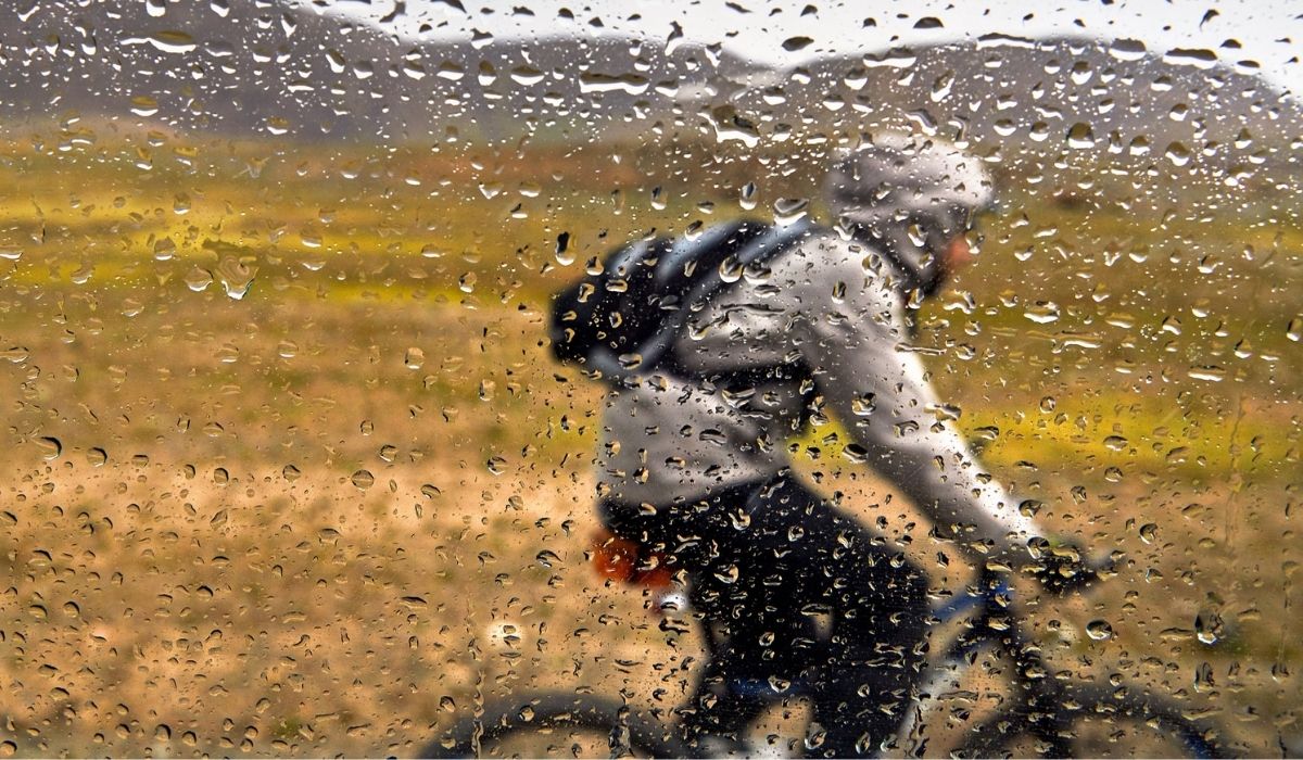 Mountain bike rider in rain