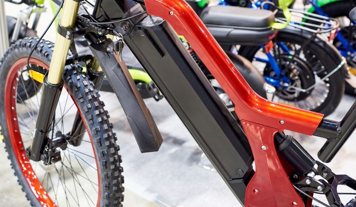 Electric bike with battery under frame in store
