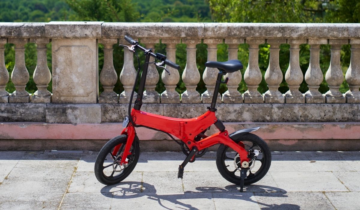 A folding electric red bicycle