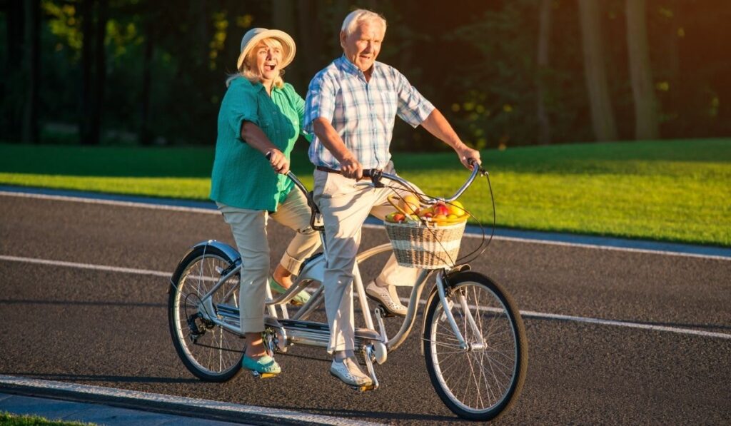 Senior couple on country bike ride 