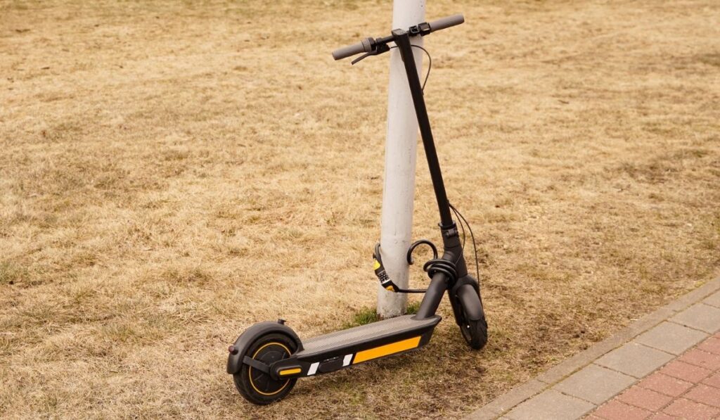 Electric scooter with a combination lock